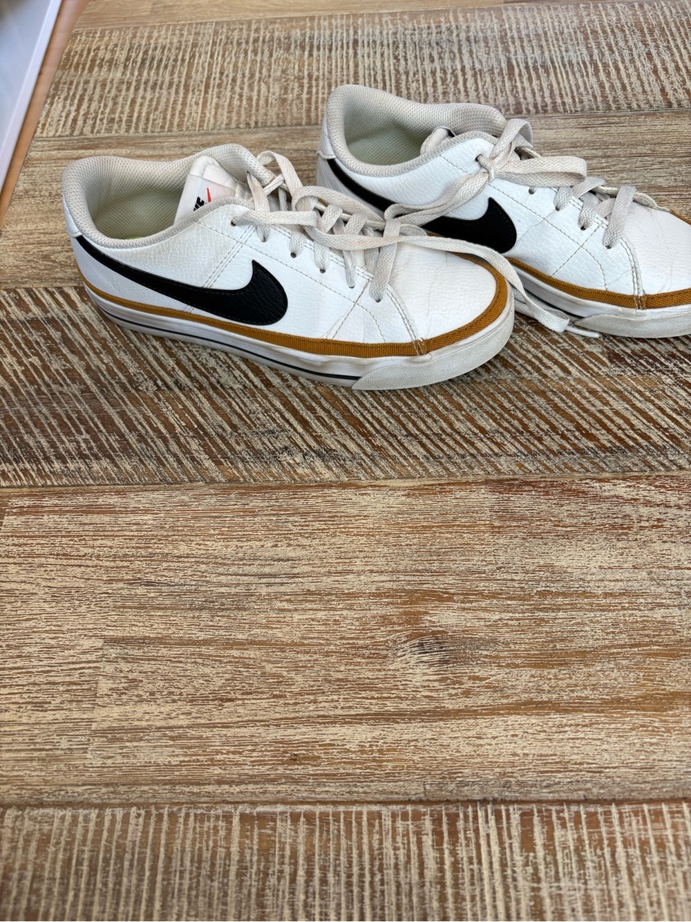 Nike White Sneakers with Black Swoosh and Tan Trim